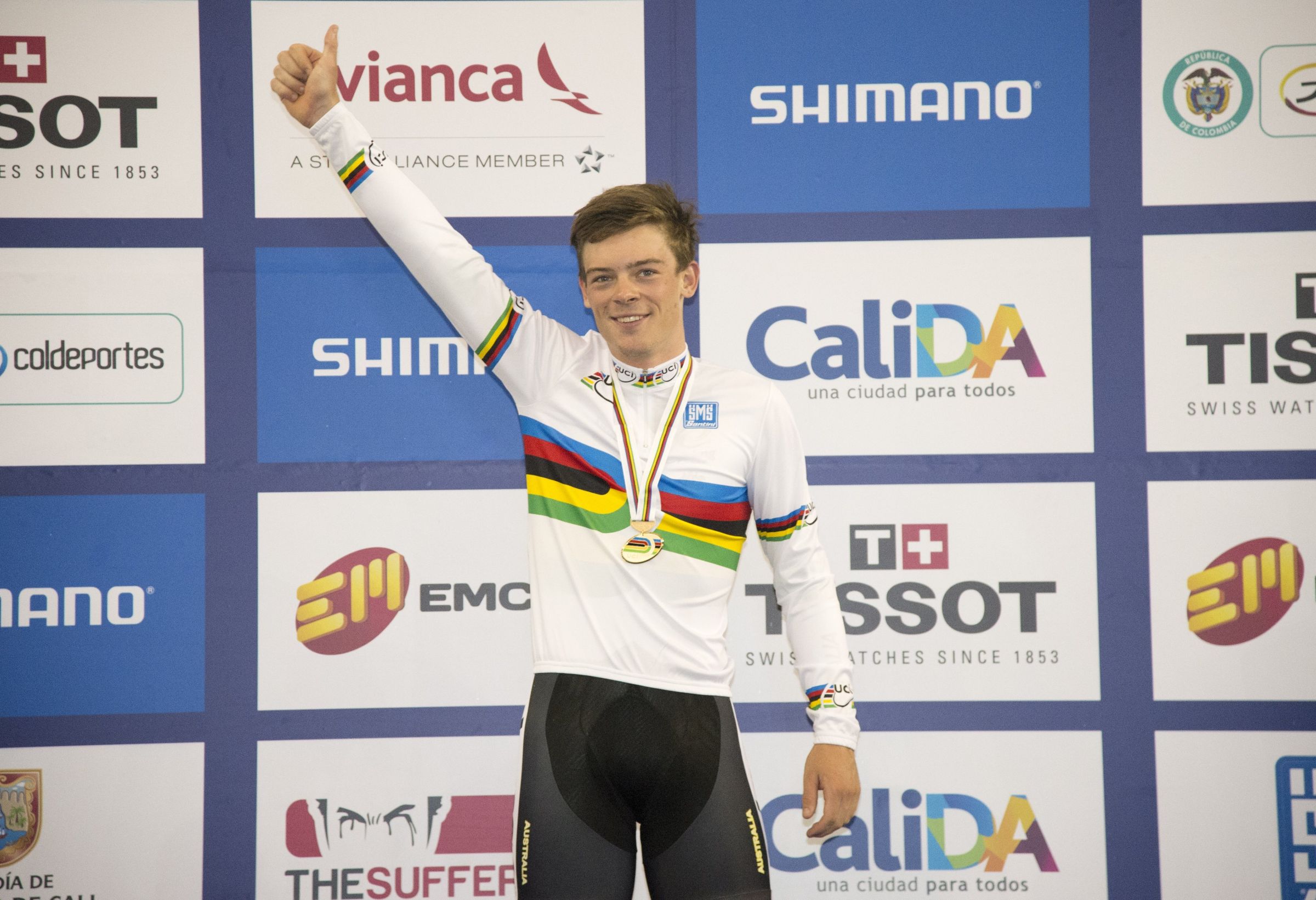 Alex Edmondson poses with gold medal and rainbow jersey as the world champion of the individual pursuit at the UCI Track World Championships in 2014. Casey Gibson